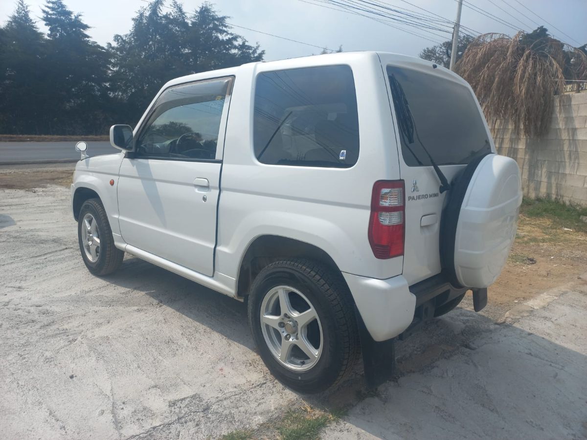 MITSUBISHI  PAJERO MINI - 2010                                        